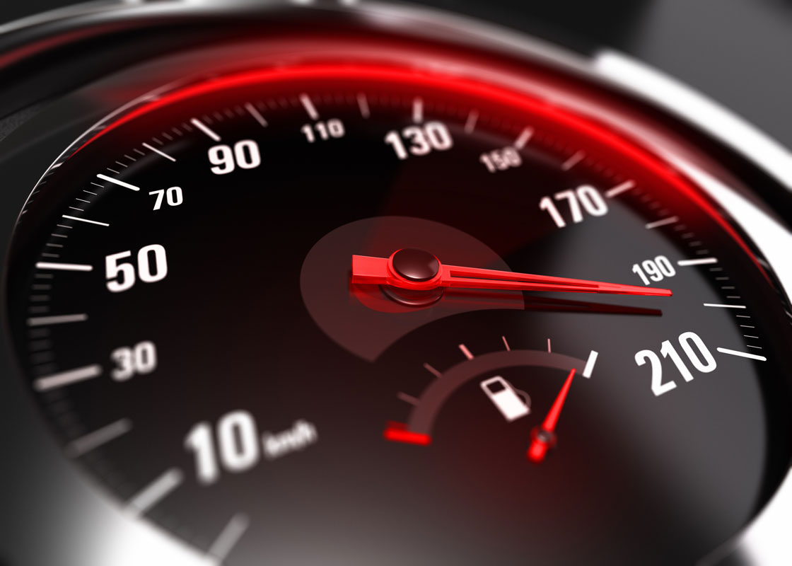 A car speedometer at 200 km/h, indicating excessive speeding.